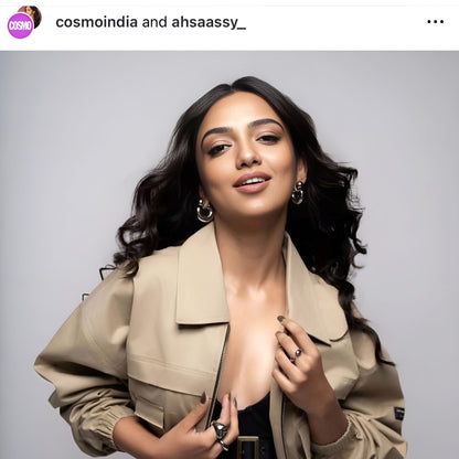 Magazine cover look featuring AEQEA Stack Rings collection with beige trench coat and elegant jewelry styling for Cosmopolitan India