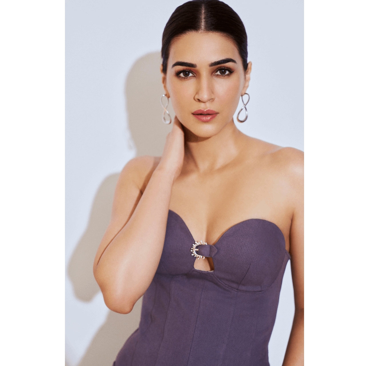 KRITI SANON IN SILVER BREEZE EARRINGS BY AEQEA